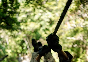 7th Communication Battalion Marines conduct jungle endurance obstacles at Jungle Warfare Training Center