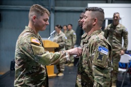 Father and Son Reunite While Serving Together in Kosovo