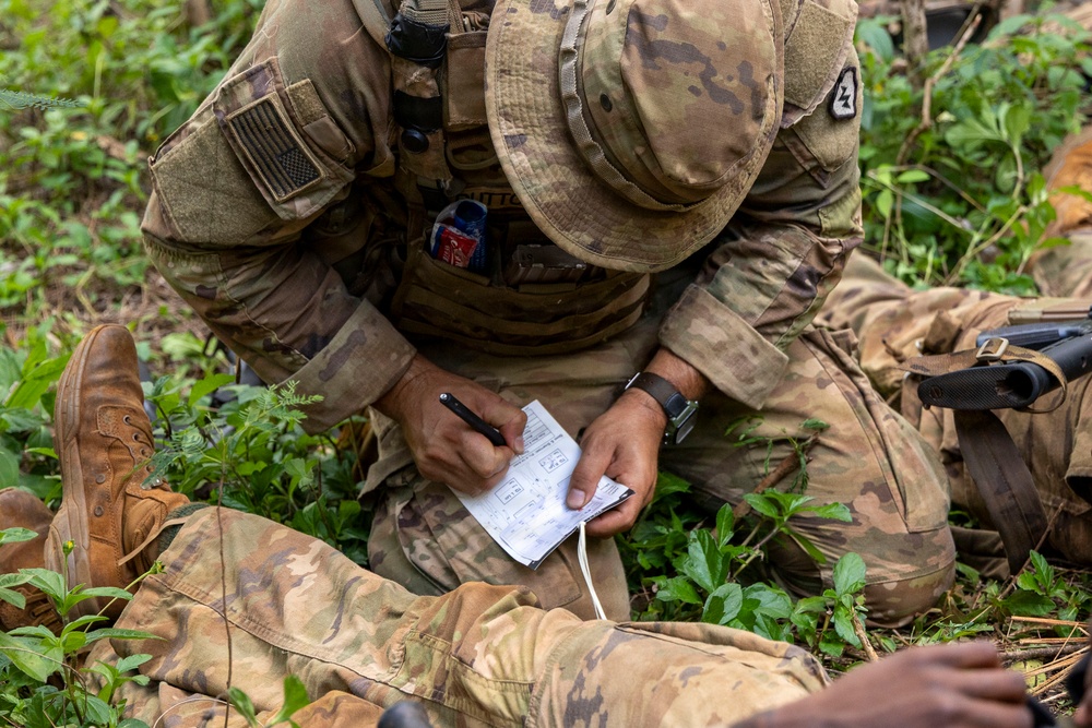 Soldiers Assess Casualties Under Fire