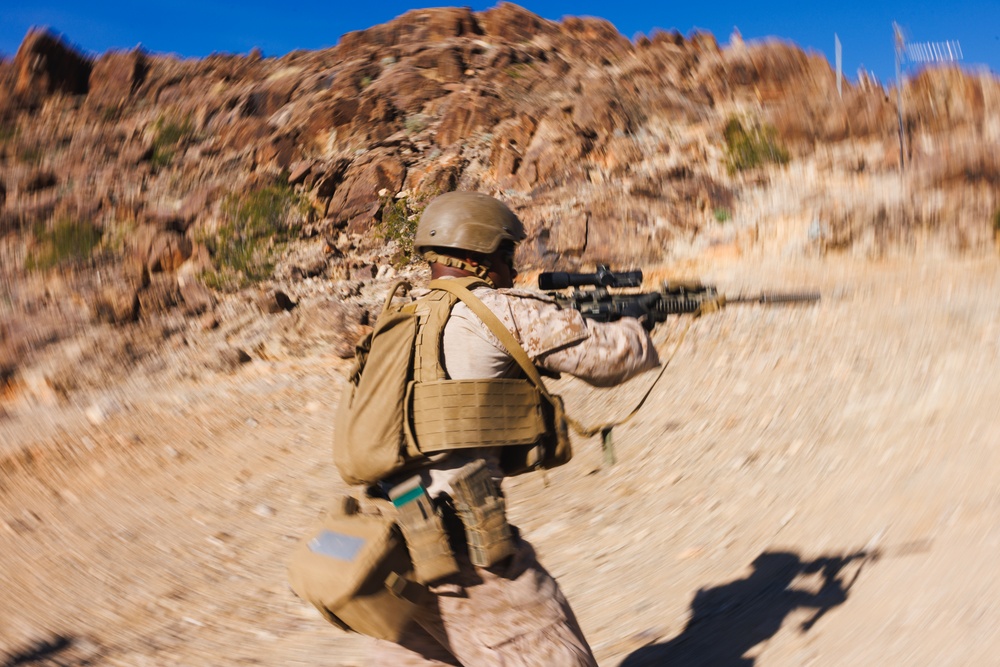 Marines with 3rd Bn., 7th Marines, 1st CEB patrol during Range 400