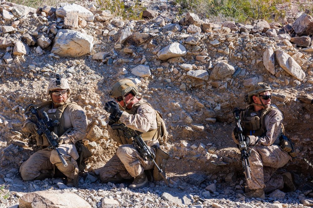 Marines with 3rd Bn., 7th Marines, 1st CEB patrol during Range 400
