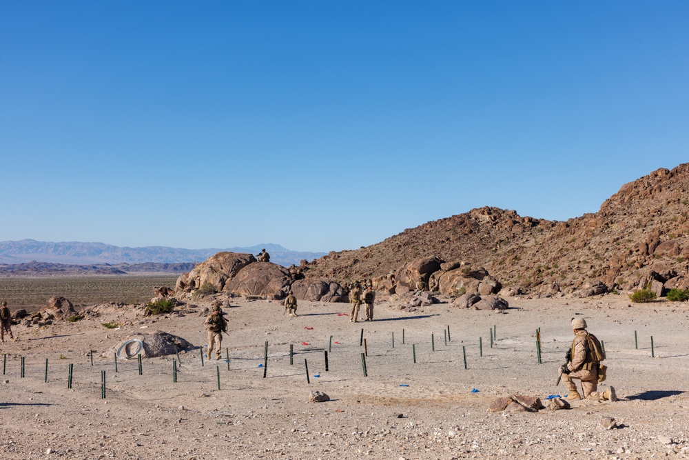 Marines with 3rd Bn., 7th Marines, 1st CEB, conduct company attacks during Range 400