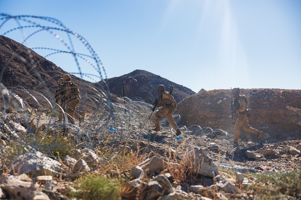 Marines with 3rd Bn., 7th Marines, 1st CEB, conduct company attacks during Range 400