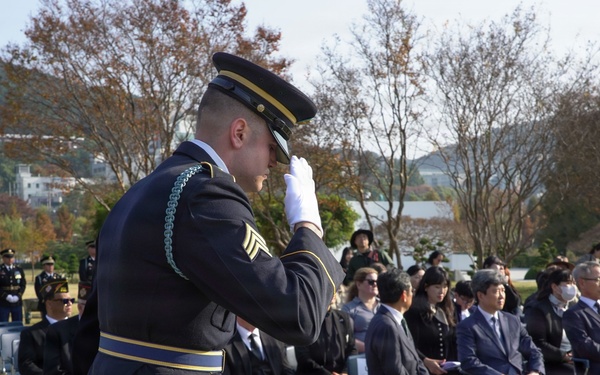 Honor guard salutes urn of retired war veteran
