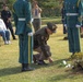 Placing flowers at the grave of a Korean War veteran