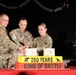 Oldest, youngest soldiers assist BG Williams in cake cutting