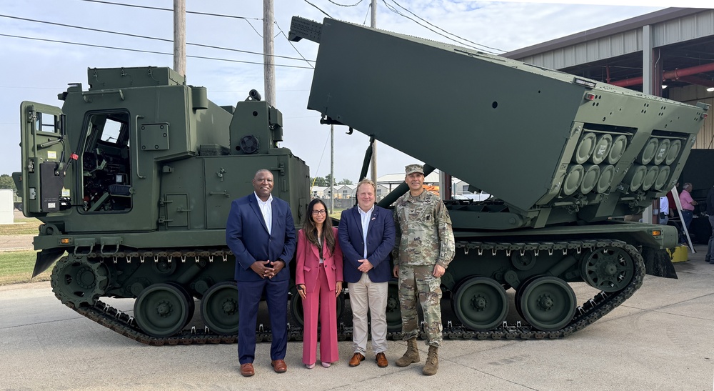 Ceremony Leaders Stand with Upgraded M270A2 at Red River