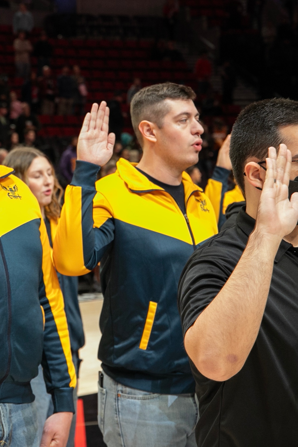Future Sailors take part in oath of enlistment at NBA game