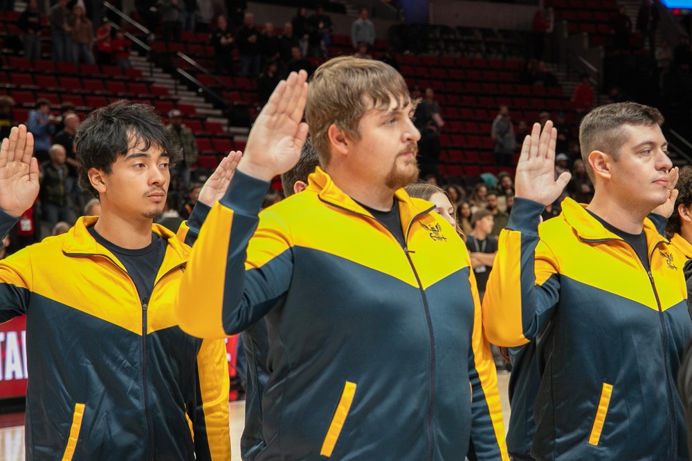 Future Sailors take part in oath of enlistment at NBA game