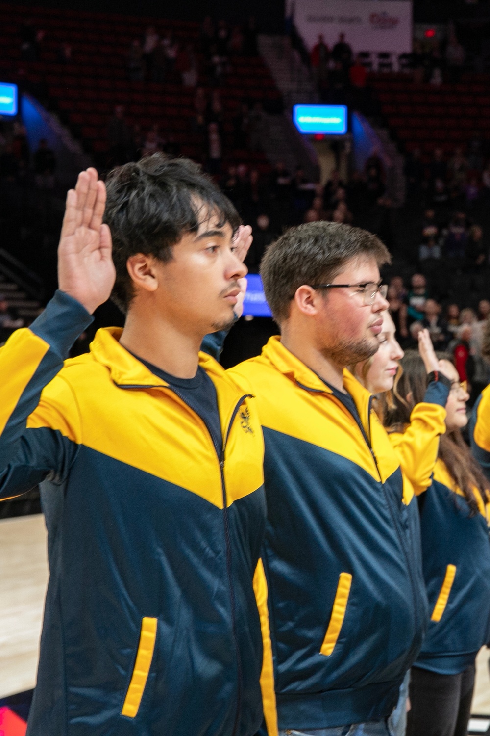 Future Sailors take part in oath of enlistment during Blazers game