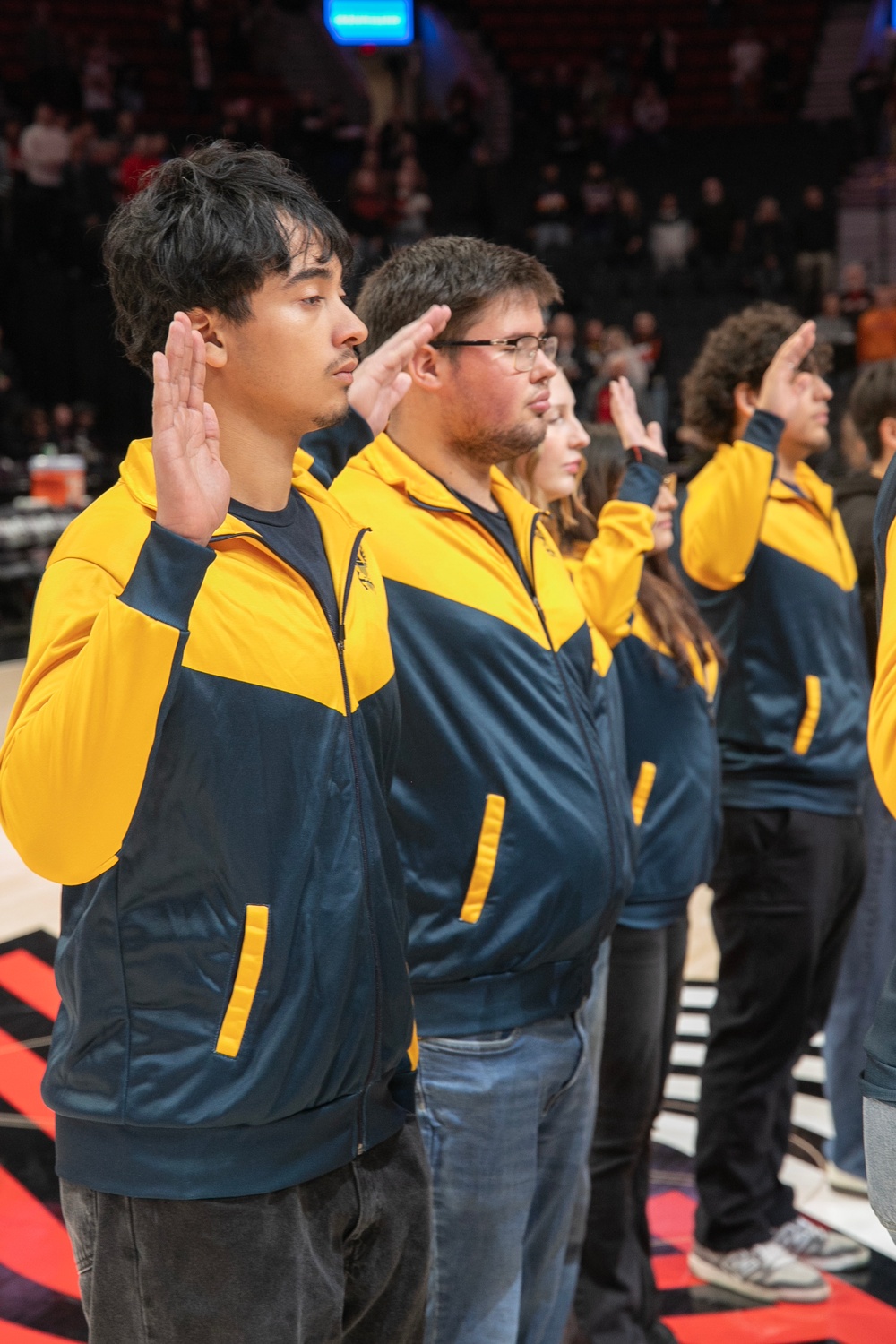 Future Sailors take part in oath of enlistment at NBA game