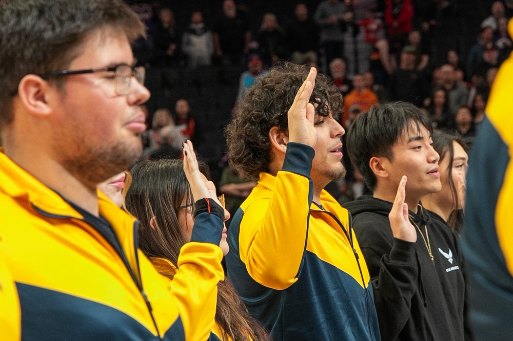 Future Sailors take part in oath of enlistment at NBA game