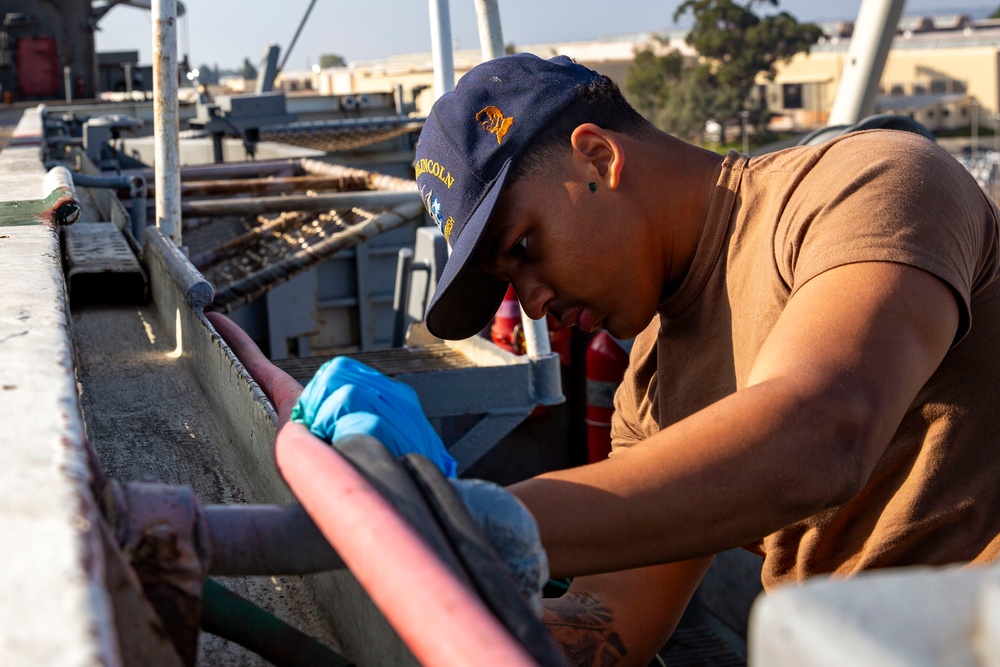 Abraham Lincoln conducts routine operations