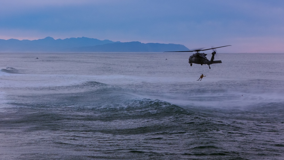 Coast Guard Aircrews Train in Surf with Air Force PJs at Fort Stevens
