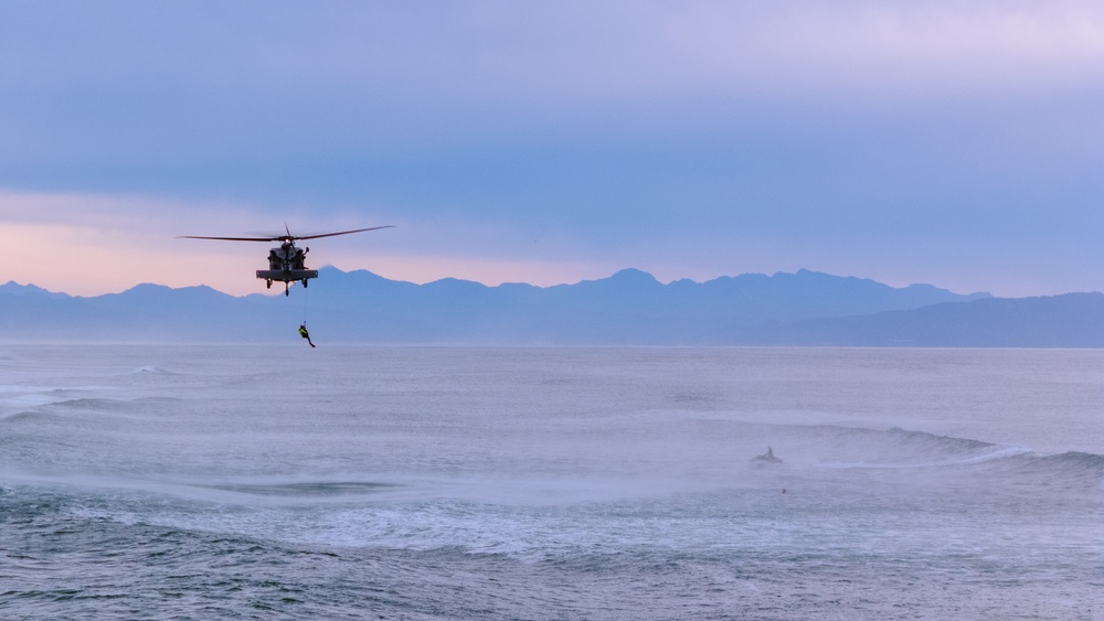 Coast Guard Aircrews Train in Surf with Air Force PJs at Fort Stevens