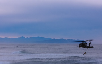 Coast Guard Aircrews Train in Surf with Air Force PJs at Fort Stevens