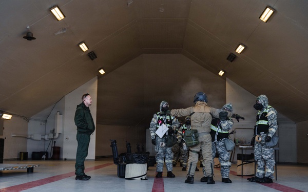 Mission Partners decon in CBRN exercise TT25