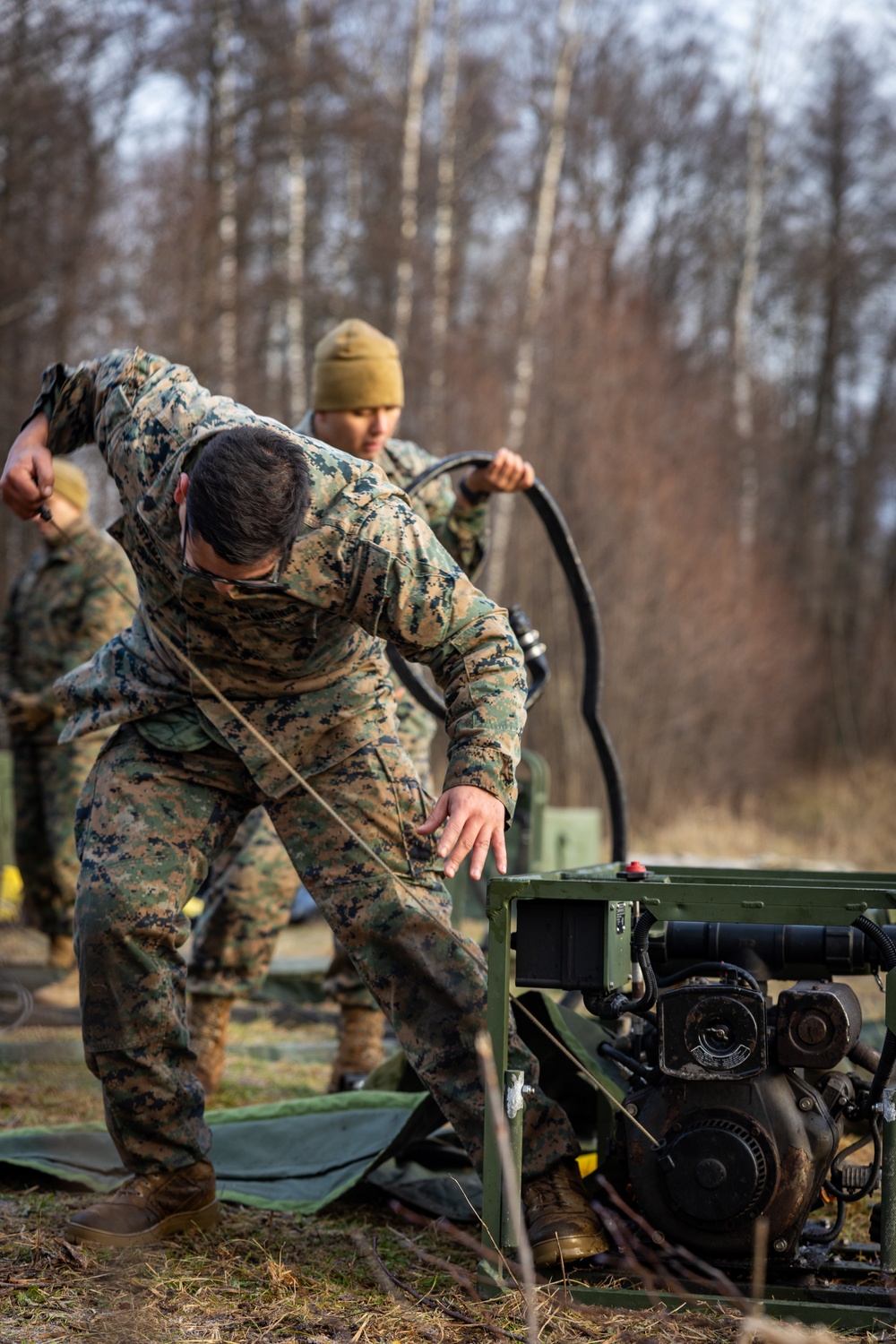 U.S. Marines demonstrate tactical water purification capability to Finnish and German service members