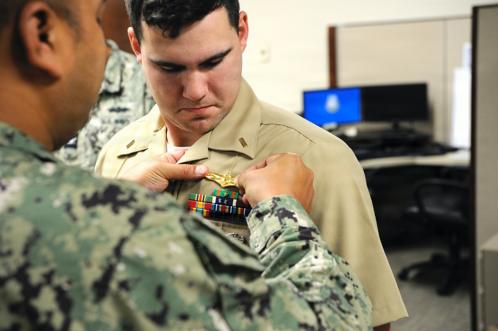 Ensign Graves Earns Information Warfare Officer Designation