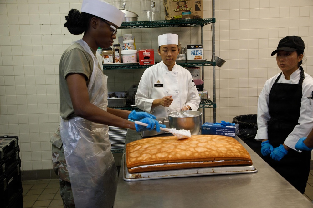 Dogface Soldiers decorate cakes