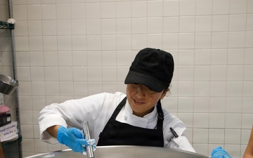 Dogface Soldiers decorate cakes