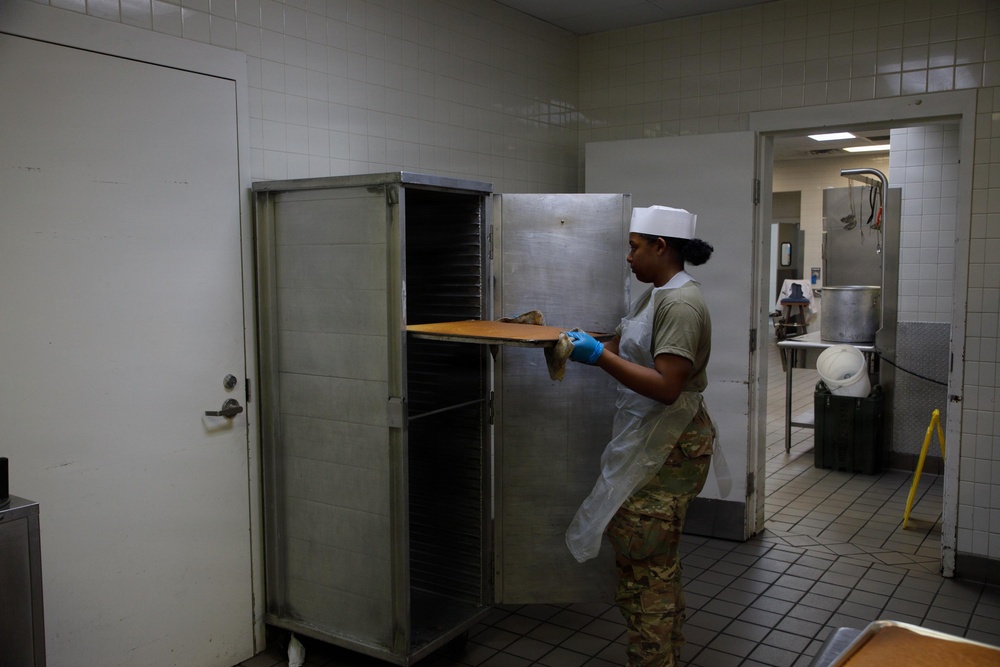 Dogface Soldiers bake cakes