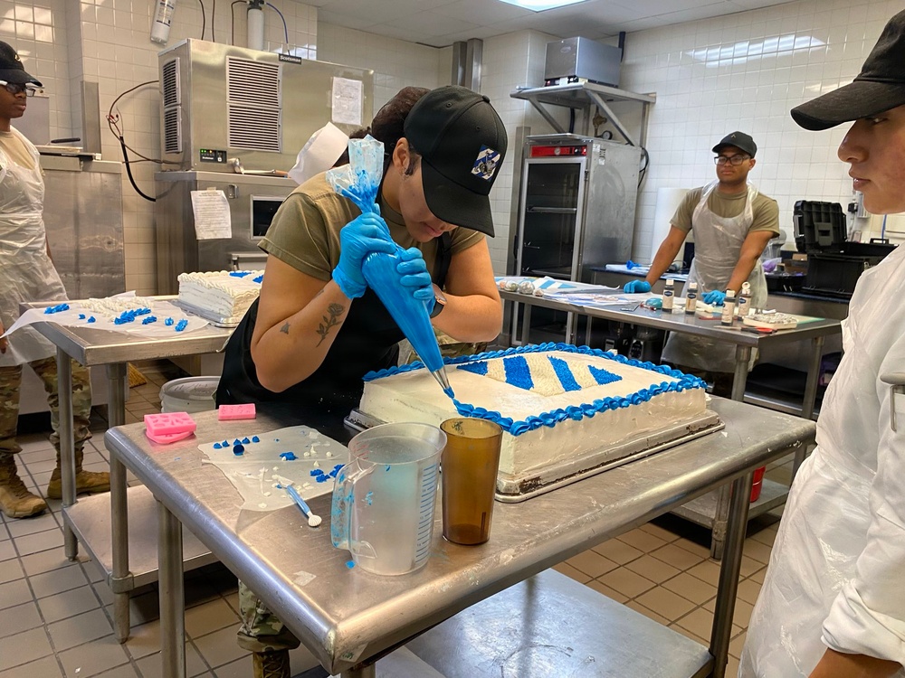 Dogface Soldiers decorate cakes