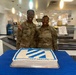 Dogface Soldiers decorate cakes