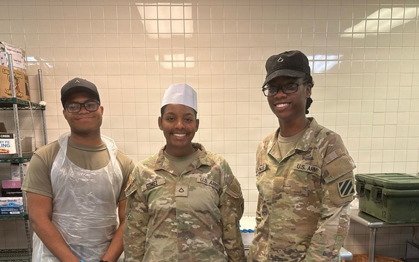 Dogface Soldiers decorate cakes