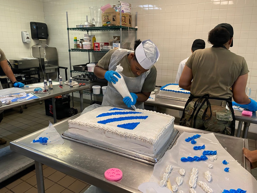 Dogface Soldiers decorate cakes