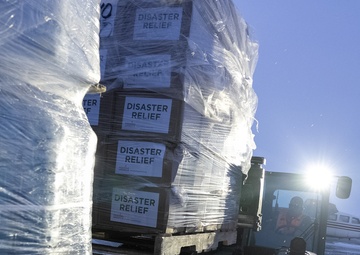 AKOM members prepare relief supplies for distribution during Operation Halong Response