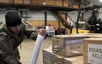 AKOM members prepare relief supplies for distribution during Operation Halong Response