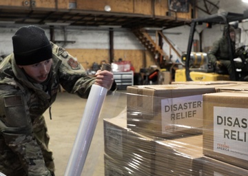 AKOM members prepare relief supplies for distribution during Operation Halong Response