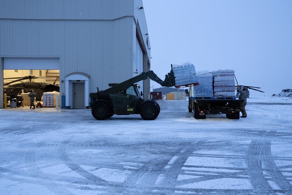 AKOM members prepare relief supplies for distribution during Operation Halong Response