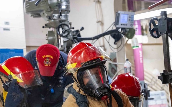 USS America Conducts An In-Port Emergency Team Drill