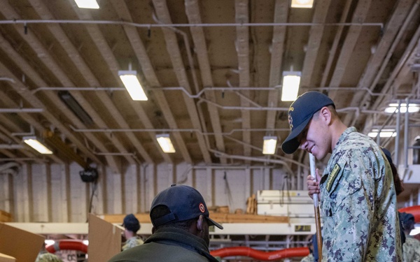 USS America (LHA 6) Conducts HAZMAT Offload