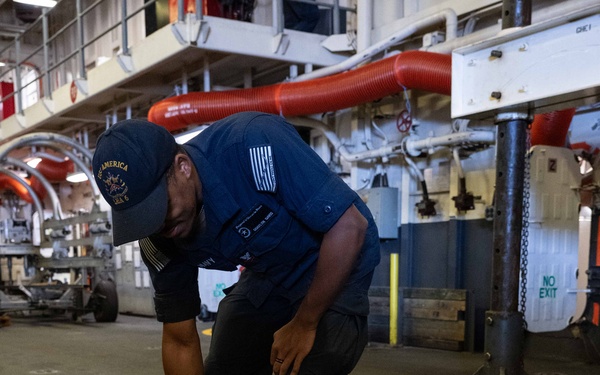 USS America (LHA 6) Conducts HAZMAT Offload