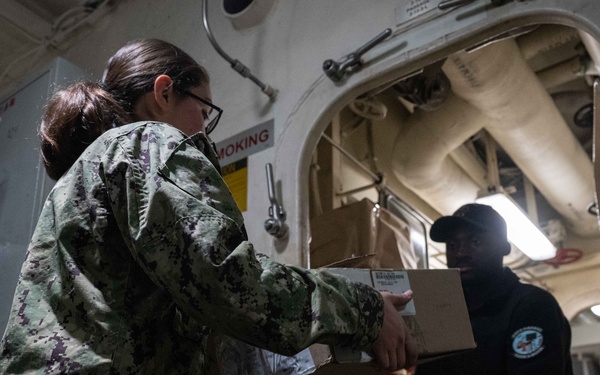 USS America (LHA 6) Conducts HAZMAT Offload