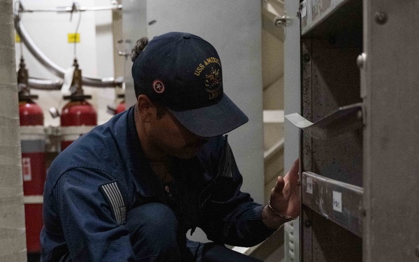 USS America (LHA 6) Conducts HAZMAT Offload