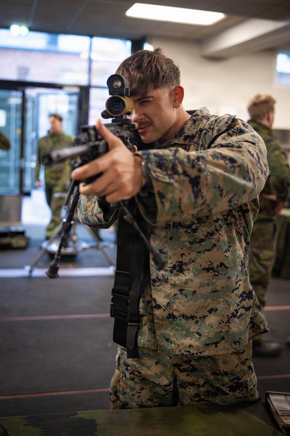 U.S. Marines attend a static display hosted by Finnish and German service members