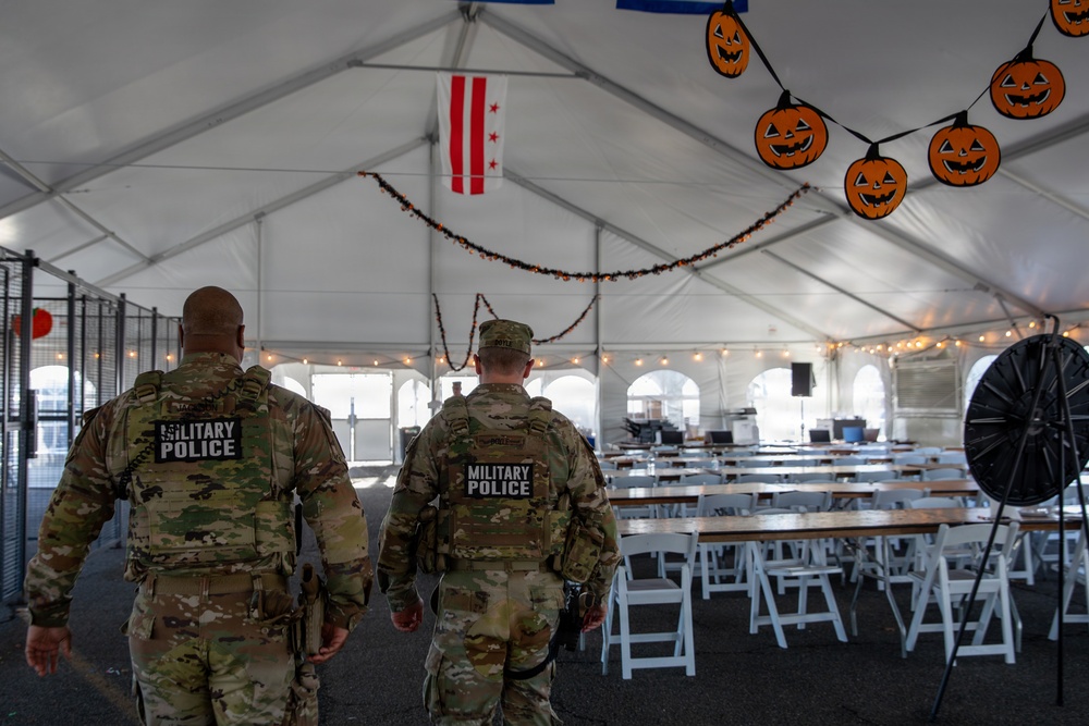 Joint Task Force Magnolia leadership visits troops on patrol on Halloween