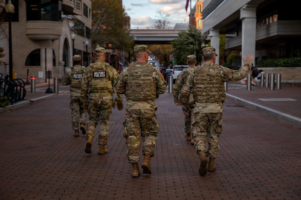 Joint Task Force Magnolia leadership visits troops on patrol on Halloween
