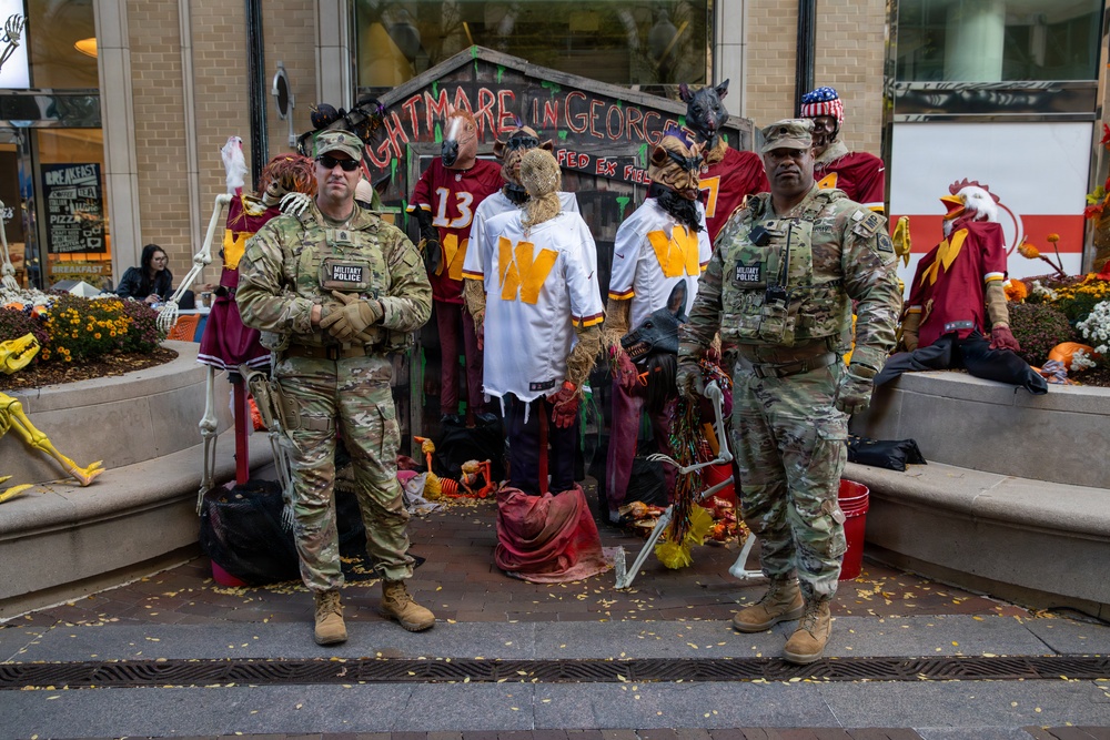 Joint Task Force Magnolia leadership visits troops on patrol on Halloween