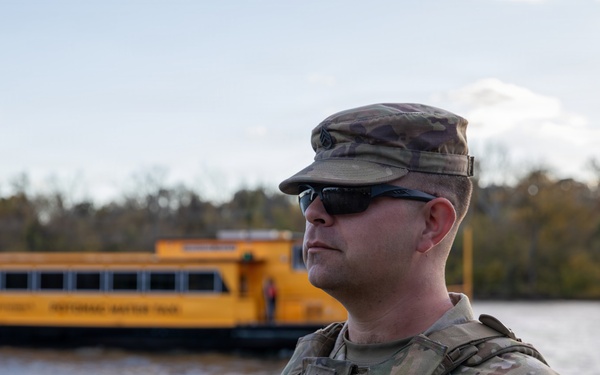 Joint Task Force Magnolia Soldier on patrol during Halloween