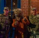 Joint Task Force Magnolia leadership takes pictures with the public on patrol on Halloween