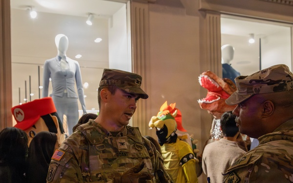 Joint Task Force–District of Columbia commander speaks with Joint Task Force Magnolia commander during Halloween