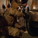 A Mississippi Army National Guard Soldier changes a tire on Halloween