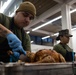 U.S. Marines, prepare Thanksgiving meal for Marines, Sailors while on European deployment