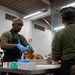 U.S. Marines, prepare Thanksgiving meal for Marines, Sailors while on European deployment