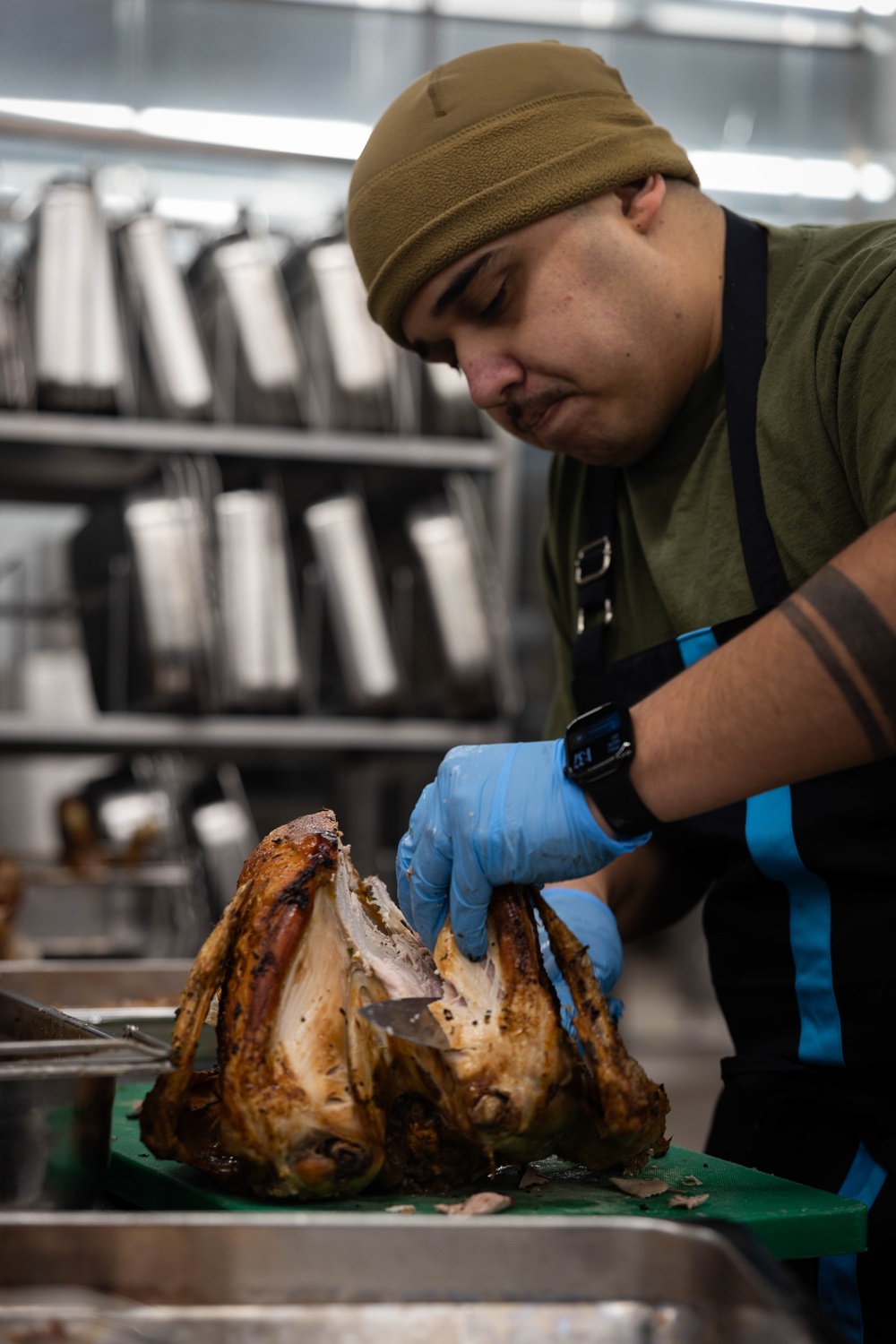 U.S. Marines, prepare Thanksgiving meal for Marines, Sailors while on European deployment